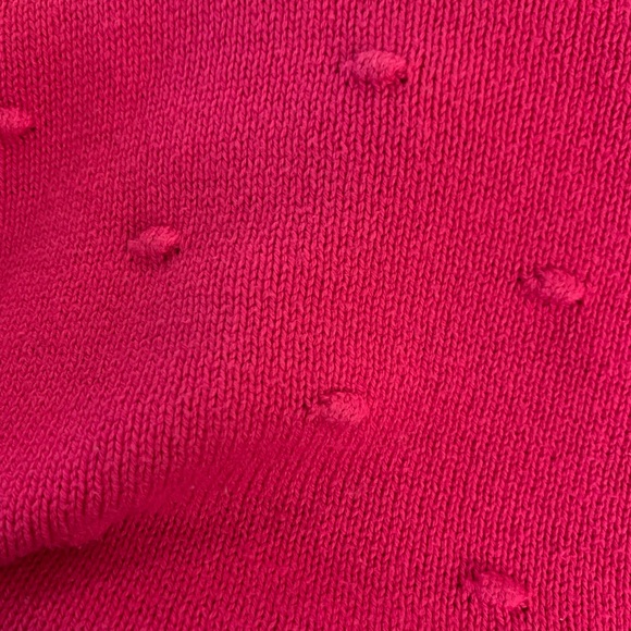 Hot pink cardigan with dot pattern and wide sleeve that tapers at wrist. - Picture 2 of 3